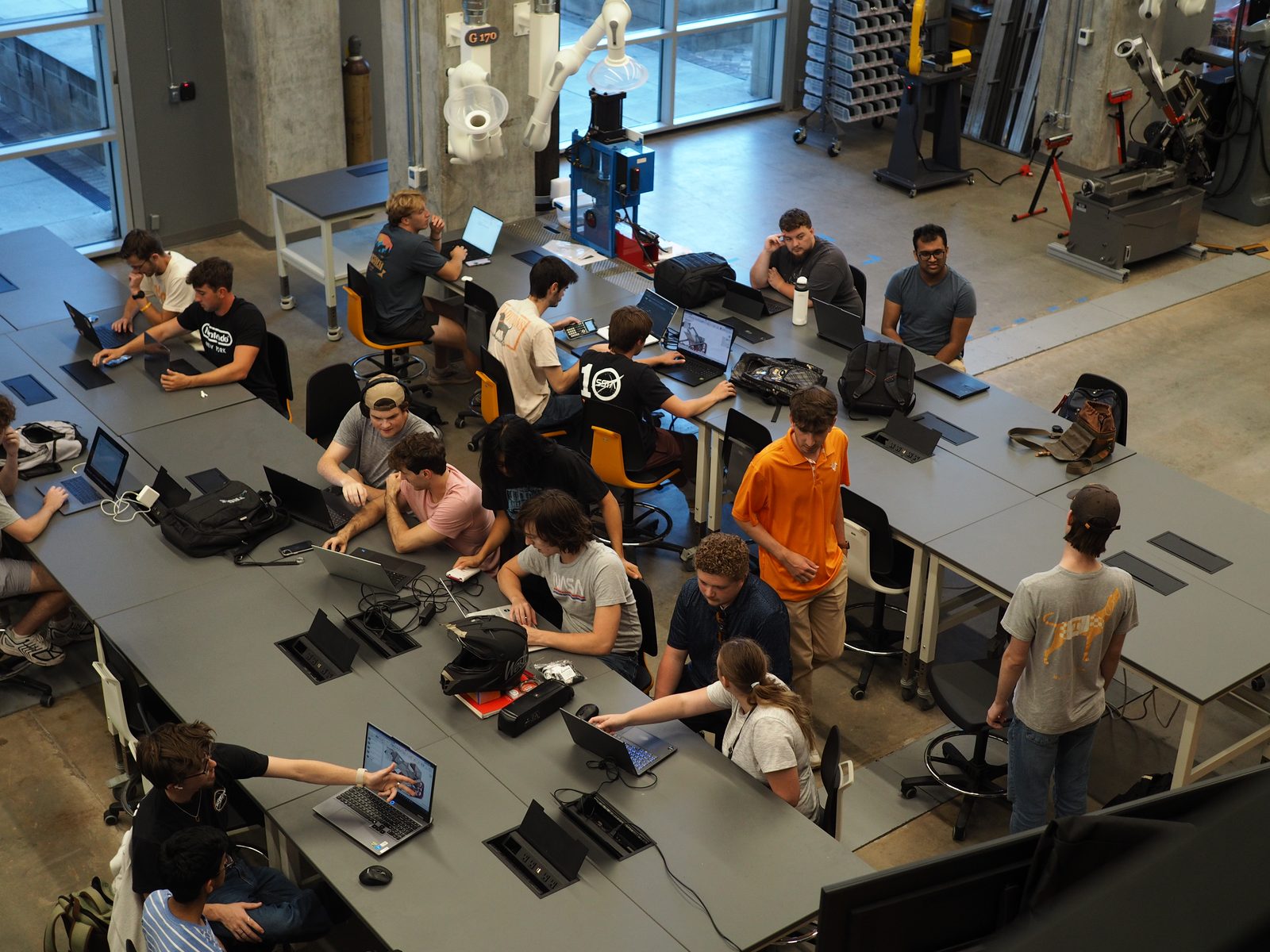 Students assembling a rocket airframe