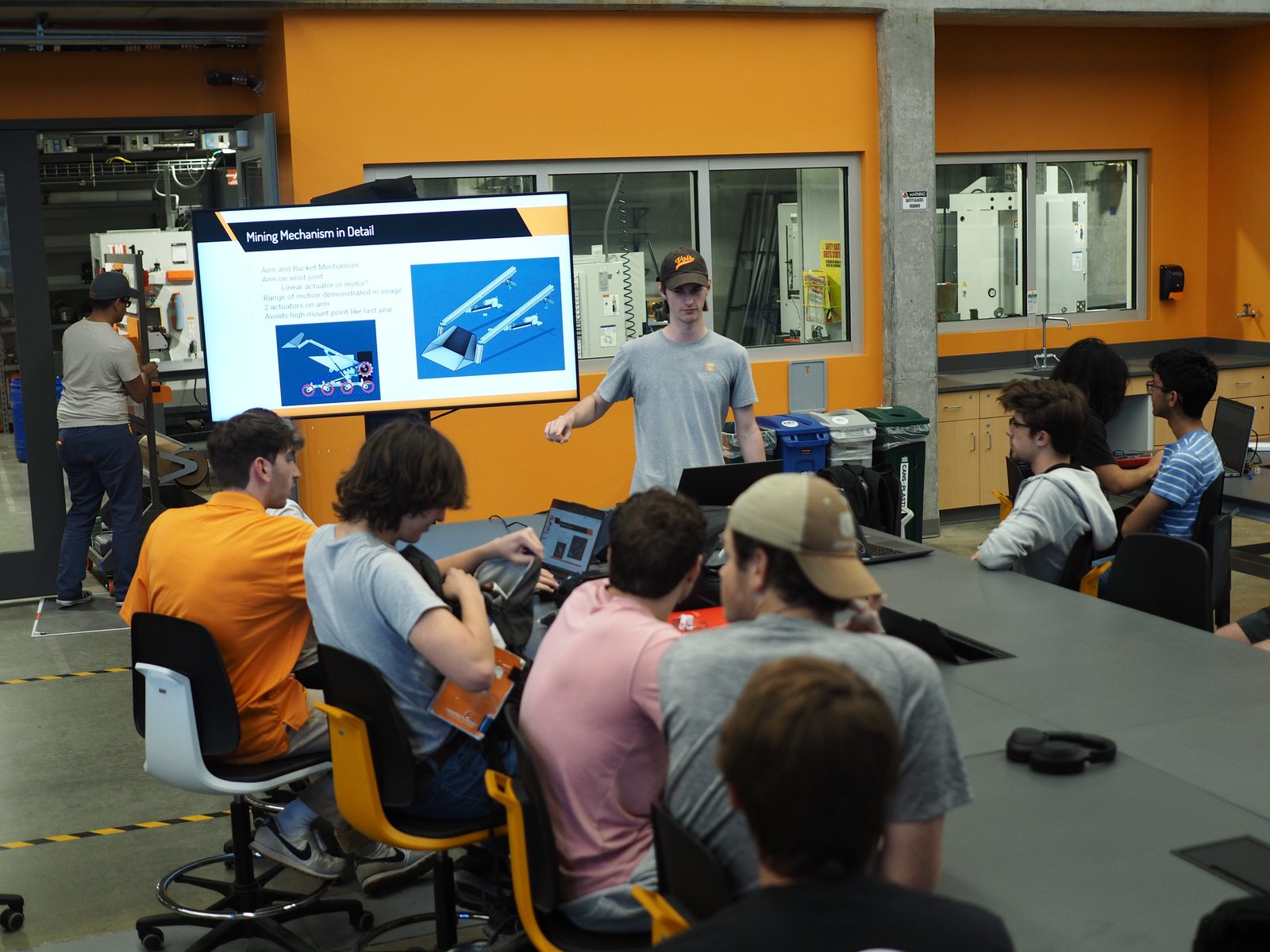 Students assembling a rocket airframe